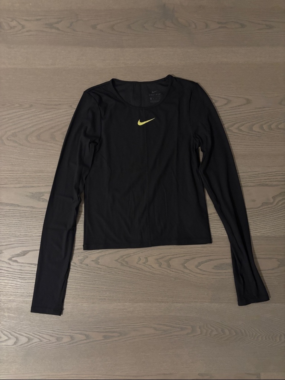 Nike Black Long-Sleeve Women's Performance Top with Yellow Swoosh